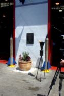 The memorial site at the entrance to the garage
