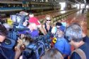 One of the fathers talking to the press