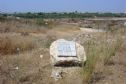 The monument near the road to Alfei Menashe, in the background the city of Kalkiliya