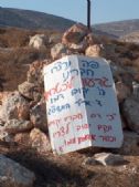 The sign on the cairn