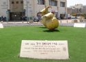 The memorial plaque in the square