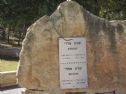 The memorial stone with his military "dog" tags