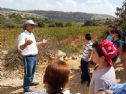 Hallel's father tells her story to a group of visitors